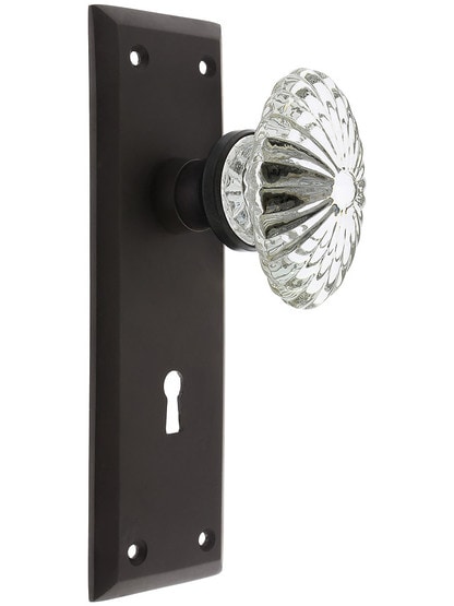 New York Plate with Oval Fluted Crystal Knob with Keyhole in Oil Rubbed Bronze.